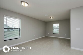 387 Begonia Ct in Poinciana, FL - Building Photo - Building Photo