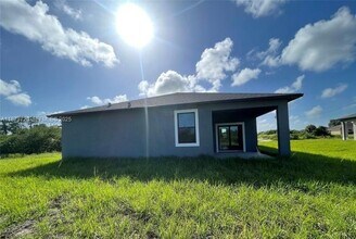 3034 E Briarwood Cir in La Belle, FL - Building Photo - Building Photo
