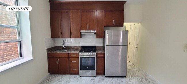 property at 37-34 12th St