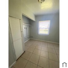 238 NW 11th Ave in South Bay, FL - Building Photo - Building Photo