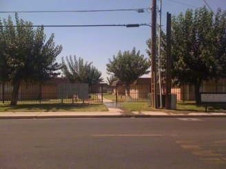 The Albany Apartments in Delano, CA - Building Photo