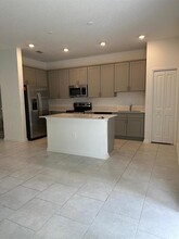 7572 Stone Crk Trl in Kissimmee, FL - Building Photo - Building Photo