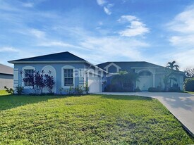 1943 SW Brisbane St in Port St. Lucie, FL - Building Photo