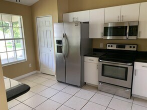 1441 SW Medina Ave in Port St. Lucie, FL - Building Photo - Building Photo
