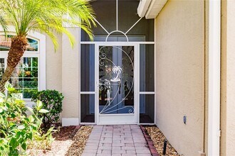 7859 Berkshire Pines Dr in Naples, FL - Building Photo - Building Photo