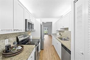 1401 SW 128th Ter, Unit # 103H in Pembroke Pines, FL - Foto de edificio - Building Photo