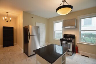 10 Bucknam St, Unit 1 in Boston, MA - Building Photo - Building Photo