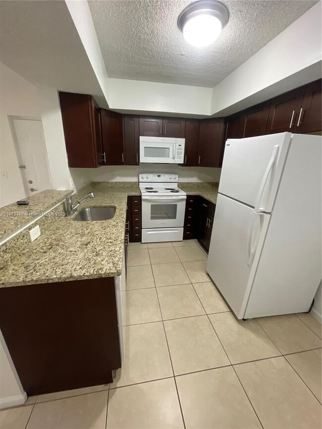 property at 5530 NW 61st St