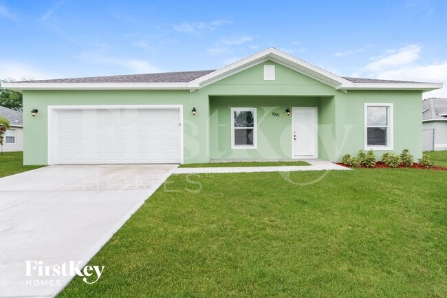 1021 Locust Ave in Palm Bay, FL - Foto de edificio - Building Photo