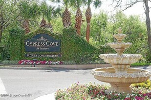 7667 N Wickham Rd in Melbourne, FL - Building Photo