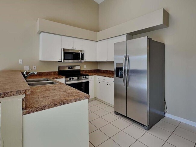13048 Meadowbreeze Dr in Wellington, FL - Building Photo - Building Photo