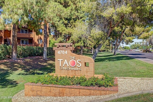 property at 4704 E Paradise Village Pkwy N
