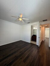 2-bedroom, 2.5-bath townhome located in Ea in Orlando, FL - Building Photo - Building Photo