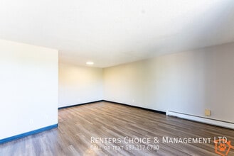 Renovated Top Floor Apartment Near Amenities in Lethbridge, AB - Building Photo - Building Photo