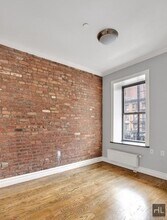 E 13TH ST., Unit 2E in New York, NY - Building Photo - Building Photo