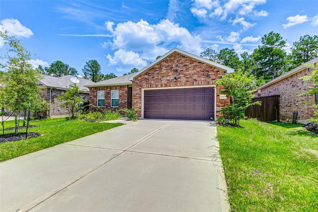 14743 Peaceful Wy in New Caney, TX - Foto de edificio