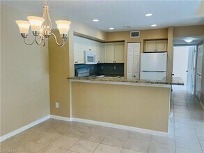 1275 Wildwood Lakes Blvd, Unit 202 in Naples, FL - Building Photo - Building Photo