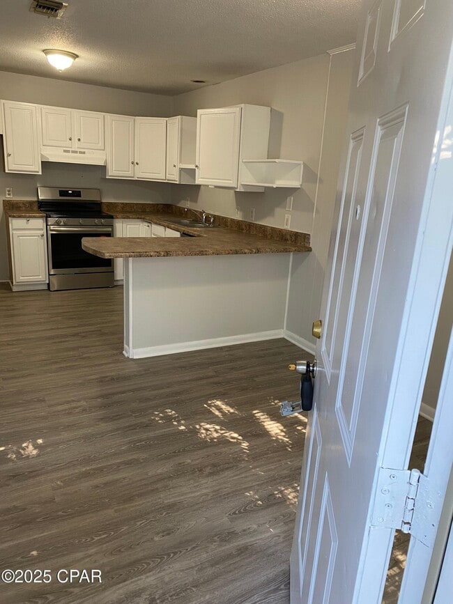 214 San Vincente St-Unit -C in Panama City Beach, FL - Building Photo - Building Photo