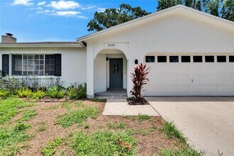 1695 E Orangecrest Ave in Palm Harbor, FL - Foto de edificio - Building Photo