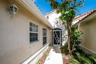 7273 Burgess Dr in Lake Worth, FL - Building Photo - Building Photo