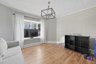 45 Highland Ave, Unit 1 in Lowell, MA - Foto de edificio - Building Photo