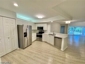 1096 Woodshire Ln in Naples, FL - Building Photo