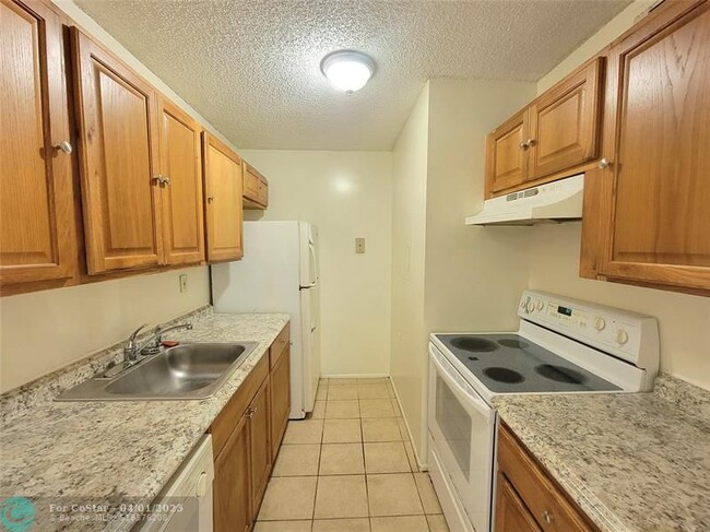 1133 Benoist Farms Rd in West Palm Beach, FL - Building Photo - Building Photo