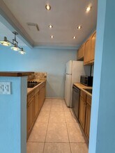 467 Golden Isles Dr, Unit 207 in Hallandale Beach, FL - Building Photo - Building Photo