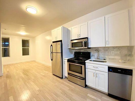 property at 512 E 117th St