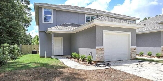 2702-2704 Appian Wy in New Caney, TX - Building Photo - Building Photo