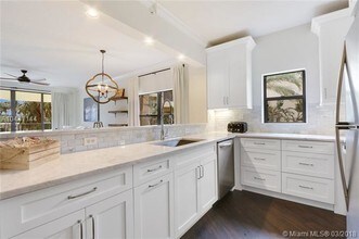 100 Uno Lago Dr-Unit -205 in North Palm Beach, FL - Building Photo - Building Photo