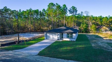 1245 W Hedgewood Ln in Citrus Springs, FL - Foto de edificio - Building Photo