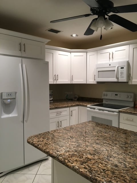 9125 W Highland Pines Dr, Unit 9119 DUPLEX APT in Palm Beach Gardens, FL - Foto de edificio - Building Photo