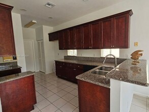 7577 Springfield Lake Dr in Greenacres, FL - Building Photo - Building Photo