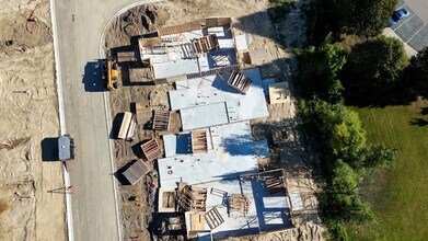 Baldwin Woods Apartments in Holly, MI - Foto de edificio - Building Photo