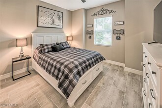 14472 Blue Bay Cir in Miromar Lakes, FL - Foto de edificio - Building Photo