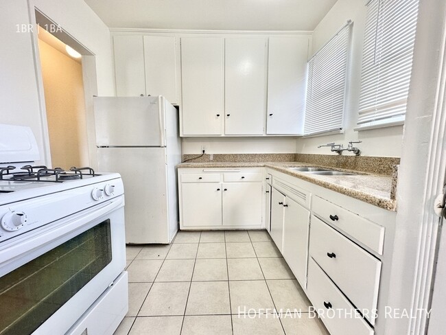 property at 6857 Willoughby Ave