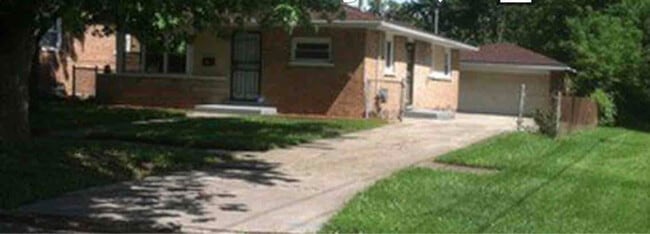 property at 1618 W 163rd St