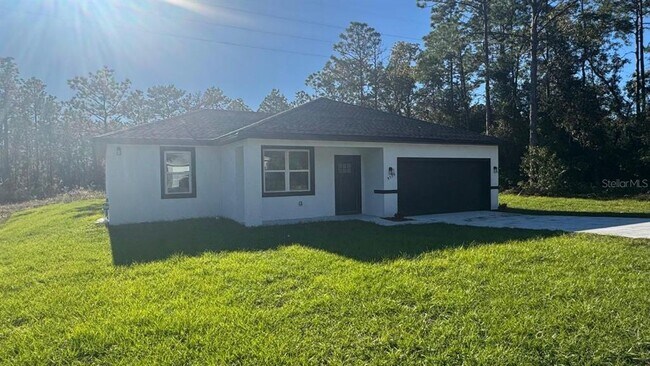 9598 N Cortlandt Dr in Citrus Springs, FL - Building Photo - Building Photo