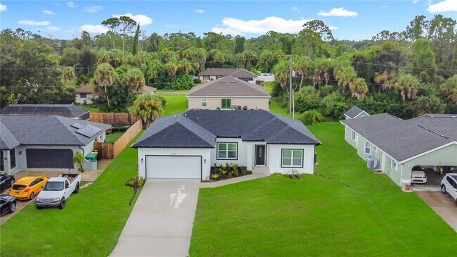 2054 Kendis St in Port Charlotte, FL - Building Photo - Building Photo