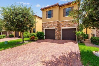 4855 NW 55th Pl in Tamarac, FL - Building Photo - Building Photo