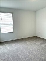 19607 Fairhill Ct in Lehigh Acres, FL - Building Photo