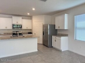 831 Remington Green Dr SE in Palm Bay, FL - Building Photo - Building Photo