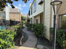 8299 Cambridge St in Houston, TX - Building Photo