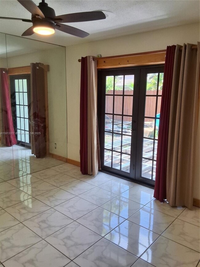 property at 8575 NW 26th Dr