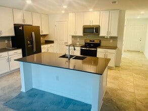 1910 Birnham Wood Bnd in Kissimmee, FL - Building Photo - Building Photo