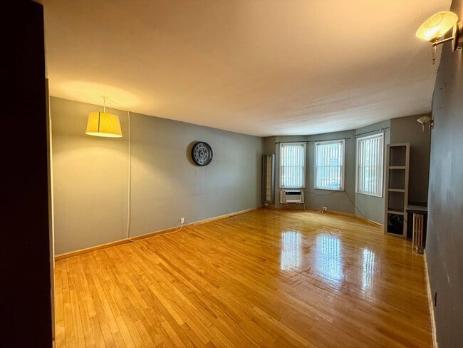 property at 64-18 Metropolitan Ave