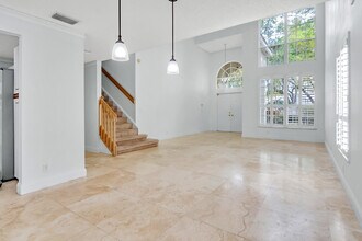 1011 Siena Oaks Cir E in Palm Beach Gardens, FL - Foto de edificio - Building Photo