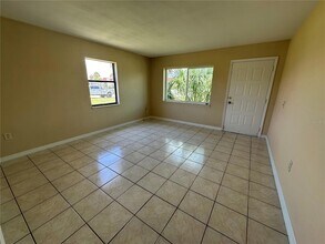 77 Boundary Blvd, Unit D in Rotonda West, FL - Building Photo - Building Photo