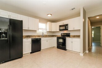 9537 Groveland St in Seminole, FL - Building Photo - Building Photo